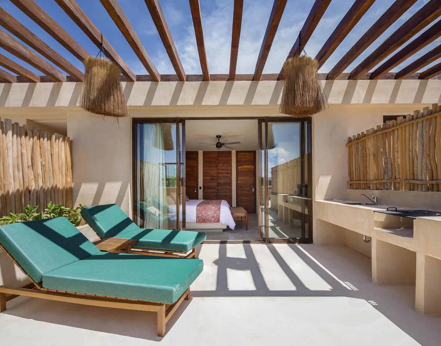 Copal Tulum Hotel Exterior photo A rooftop suite at the Habitas Hotel in Tulum, Mexico